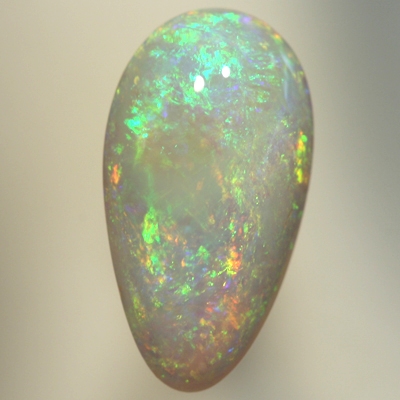 SOLID SEMI BLACK OPAL 3 D play of colour with sparkles of orange and green